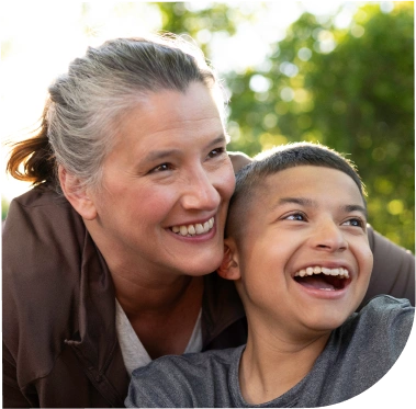 Ryan, an actual patient taking DUVYZAT for 4+ years, and his mother, Susan.